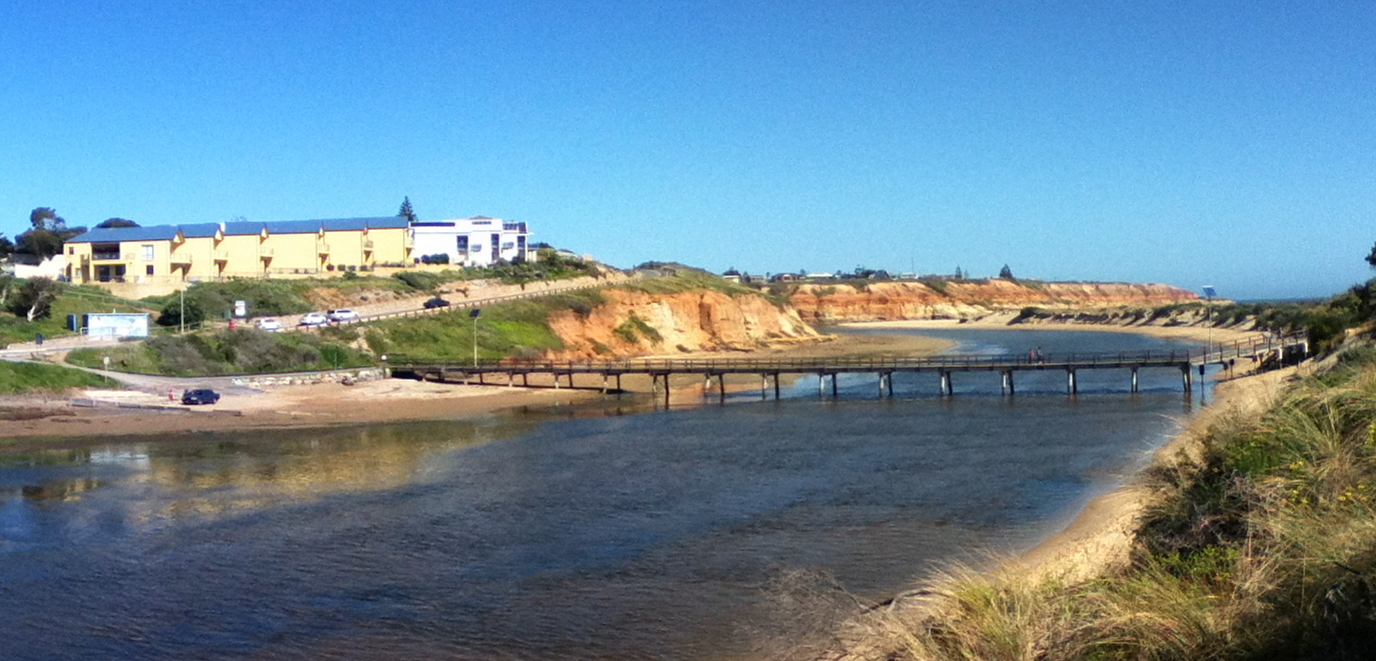 The Onkaparinga River at Port Noarlunga, with its footbridge and sandstone cliffs